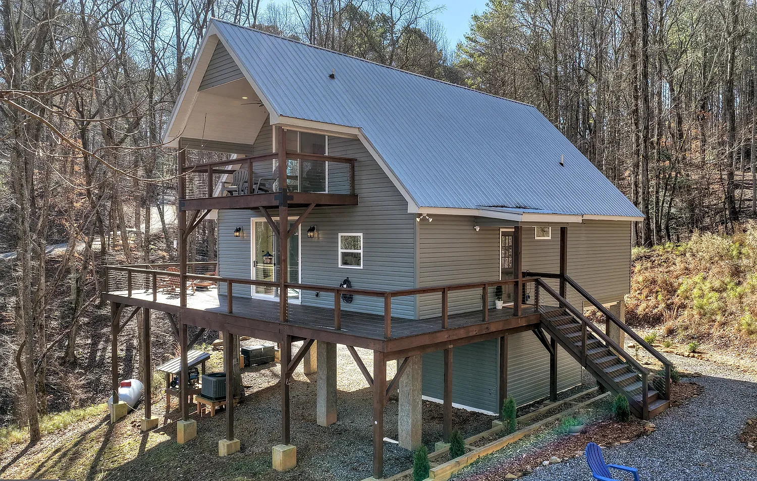 Eric DeForest’s North Georgia mountain home, showing its metal roof and elevated decks